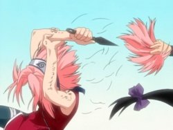 Sakura cutting her hair.jpg